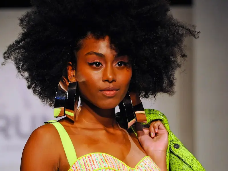Why is Black hair so glorified on runways but still discriminated against in daily life?